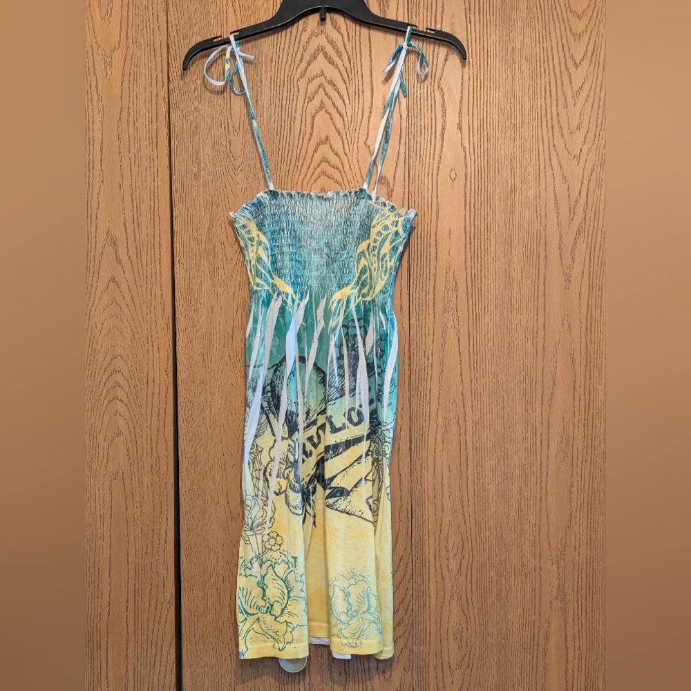Blueish Green and Yellow One Piece with Flowing Skirt and Artistic Pattern